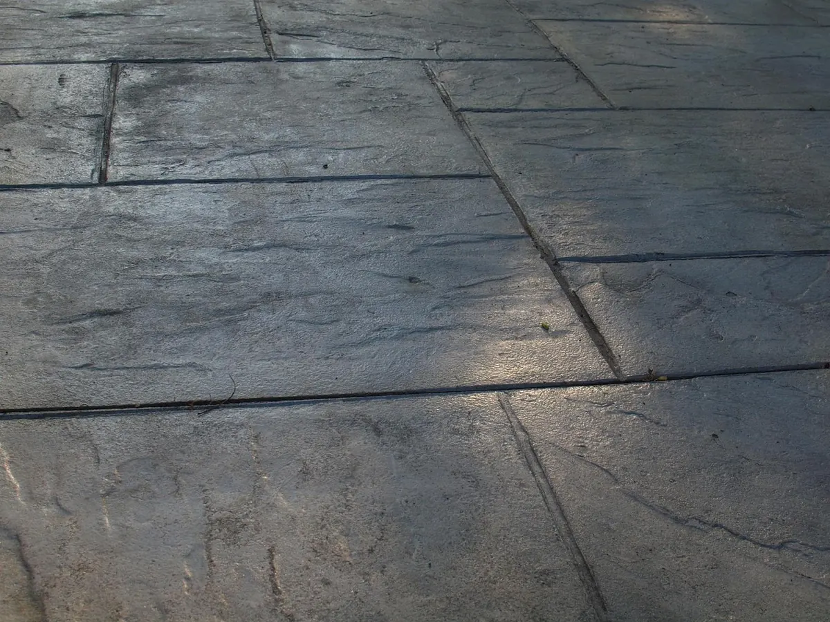 How to Lay a Natural Stone Patio on a Sand and Cement Base